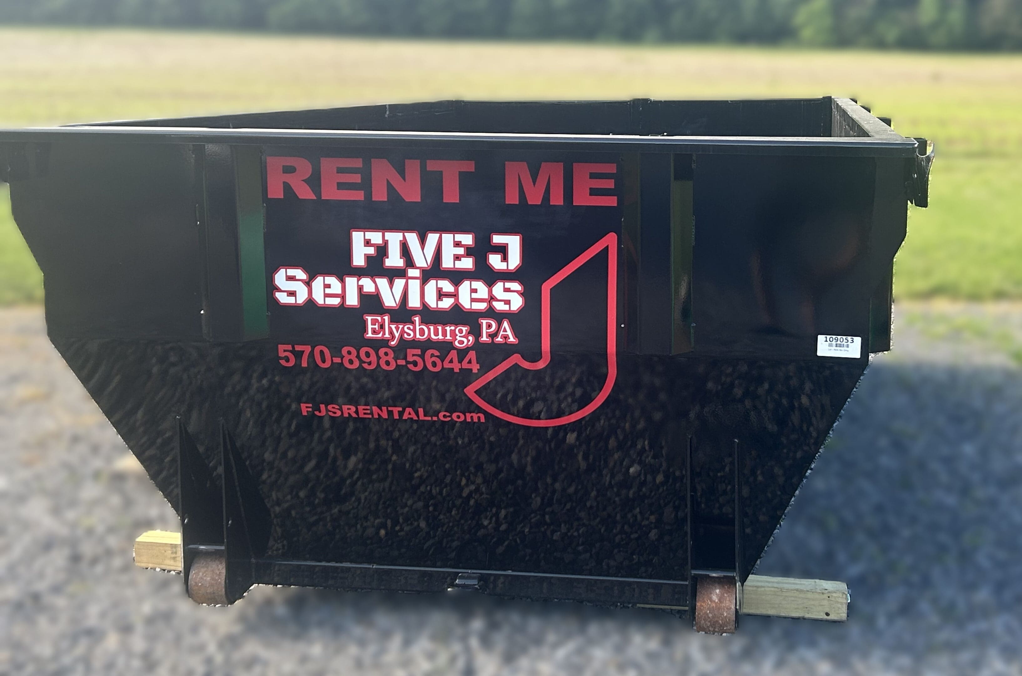 A black bin with the words rent me five j services on it.